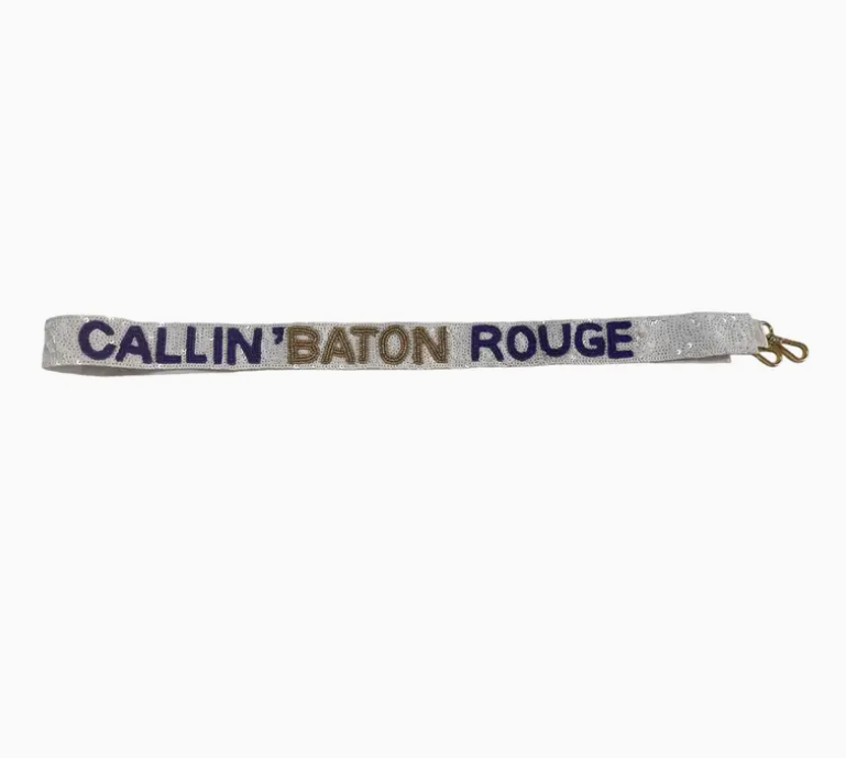White sequin purse strap with purple and gold beaded lettering for game day and LSU fans.