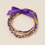 Set of purple and gold beaded bracelets for game day and LSU sports fans.
