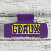 Purple and gold claw hair clip with GEAUX on it for game day for LSU sports fans.